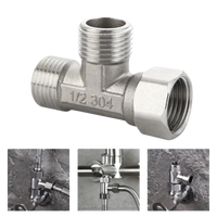 Metal plumbing T-fitting.