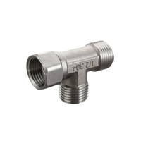 Metal T-shaped pipe fitting.