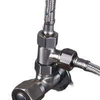 Shiny metal plumbing fixture.