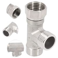 Silver-colored metal T-shaped plumbing fitting.
