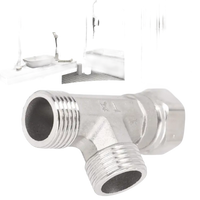 Silver metal pipe fitting.