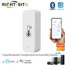 White Bluetooth temperature and humidity sensor.