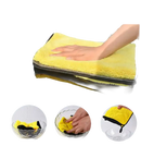 Yellow and black absorbent cleaning cloth.