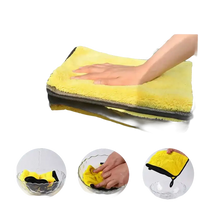 Yellow and black absorbent cleaning cloth.