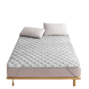 Quilted gray mattress pad.