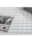 Quilted mattress protector.
