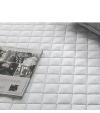 Quilted mattress protector.