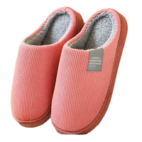 Pink corduroy slippers.
