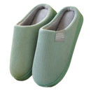 Mint-green corduroy slippers.
