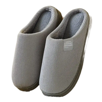Gray corduroy house slippers.