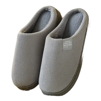 Gray corduroy slippers.