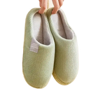 Green corduroy slippers.