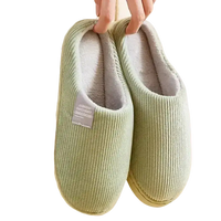 Green corduroy slippers.