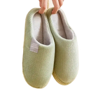 Green corduroy slippers.