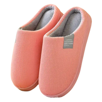 Pink corduroy slippers.