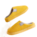 Yellow corduroy slippers.