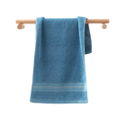 Blue towel on wooden rack.