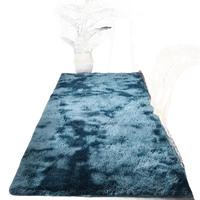 Blue ombre shag rug.