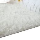 Fluffy white shag rug.