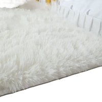 Fluffy white shag rug.