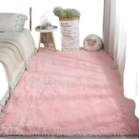 Pink fluffy rug.