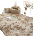 Soft, fluffy, beige rug.