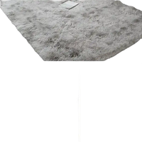 Soft, gray shag rug.