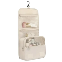 Hanging beige cosmetic bag.