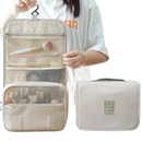 Beige hanging travel toiletry bag.
