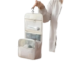 Hanging, multi-compartment toiletry bag.