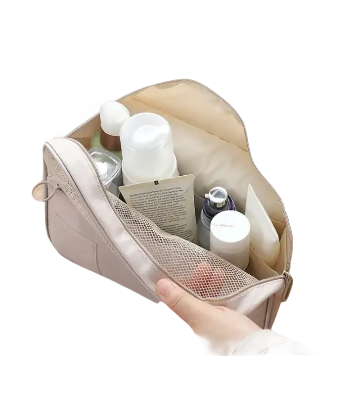 Open beige toiletry bag.