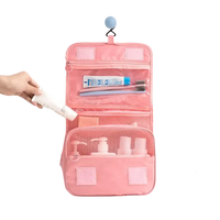 Pink hanging toiletry bag.