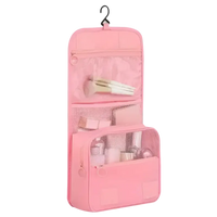 Pink hanging toiletry bag.
