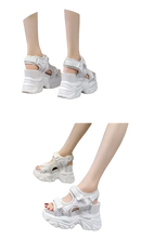 White platform sandals.