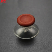 Red and clear suction cup.