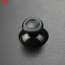 Black analog stick.