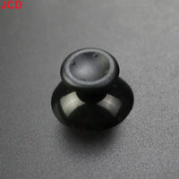 Black analog stick.