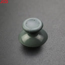 Gray analog stick.
