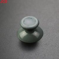 Gray analog stick.