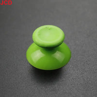 Green joystick thumbstick.
