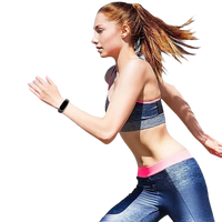 Woman running with fitness tracker.
