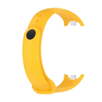 Yellow fitness tracker wristband.