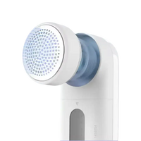 White electric lint remover.