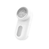 White electric lint remover.