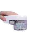 White electric lint remover.