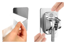 Adhesive shower head holder.