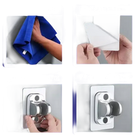 Adhesive broom holder installation instructions.