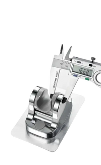 Chrome shower head holder being measured.