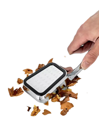 Chrome nutcracker with walnut shells.