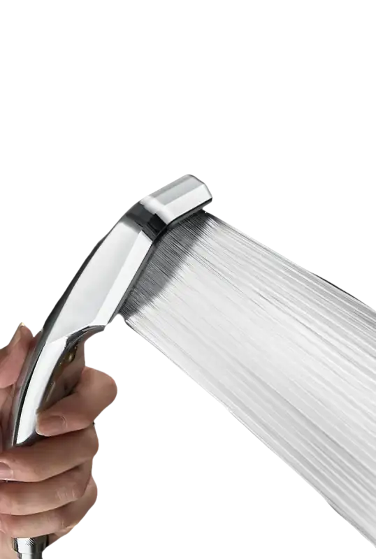 Chrome shower head with pressurized water flow.